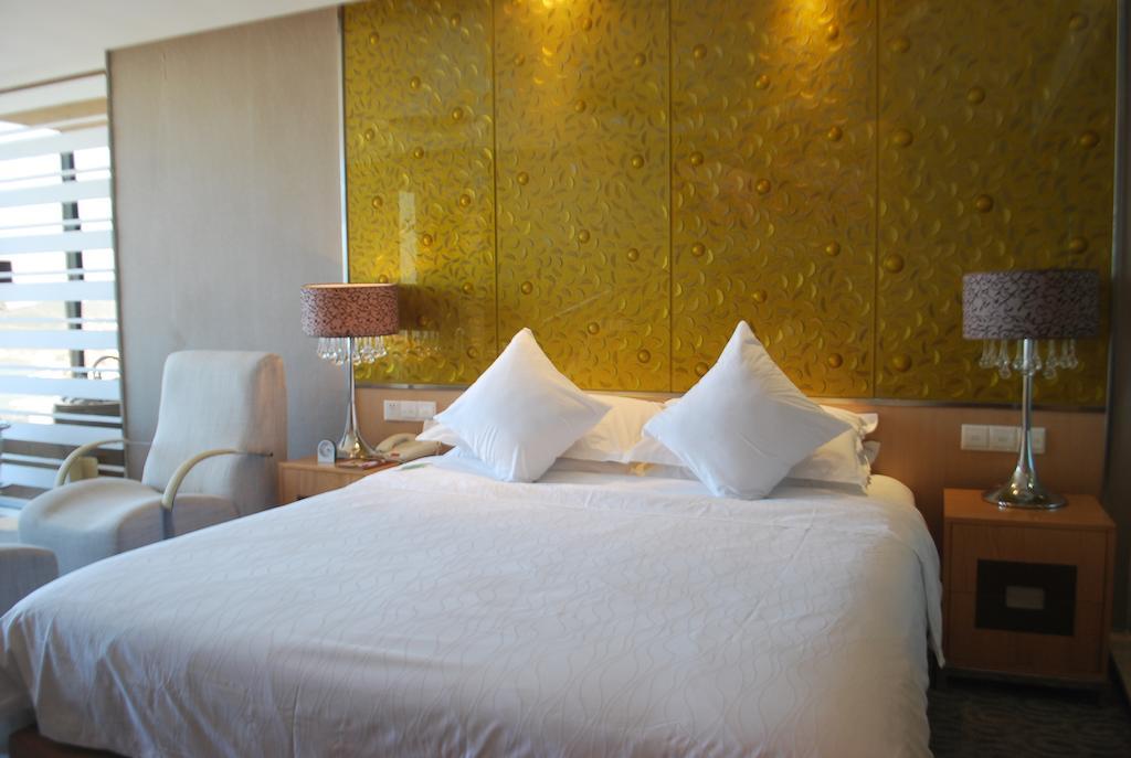 The Center Hotel Weihai Zimmer foto