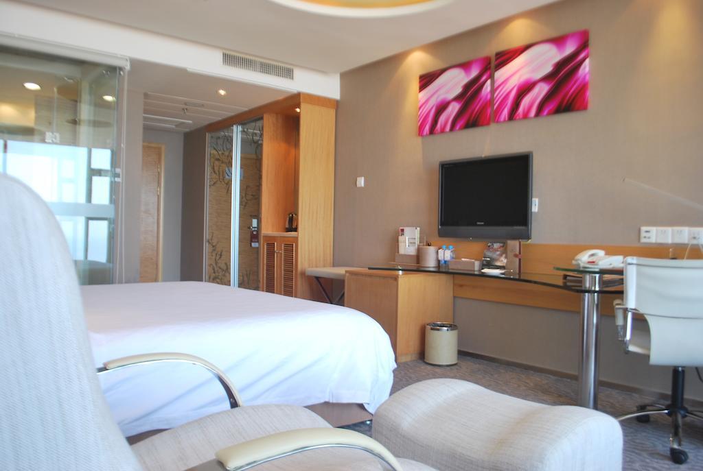 The Center Hotel Weihai Zimmer foto