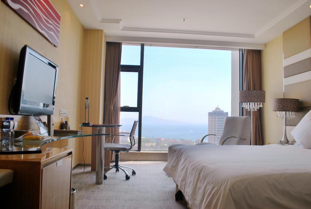 The Center Hotel Weihai Zimmer foto